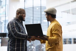 business owner planning a property investment during office tour with broker