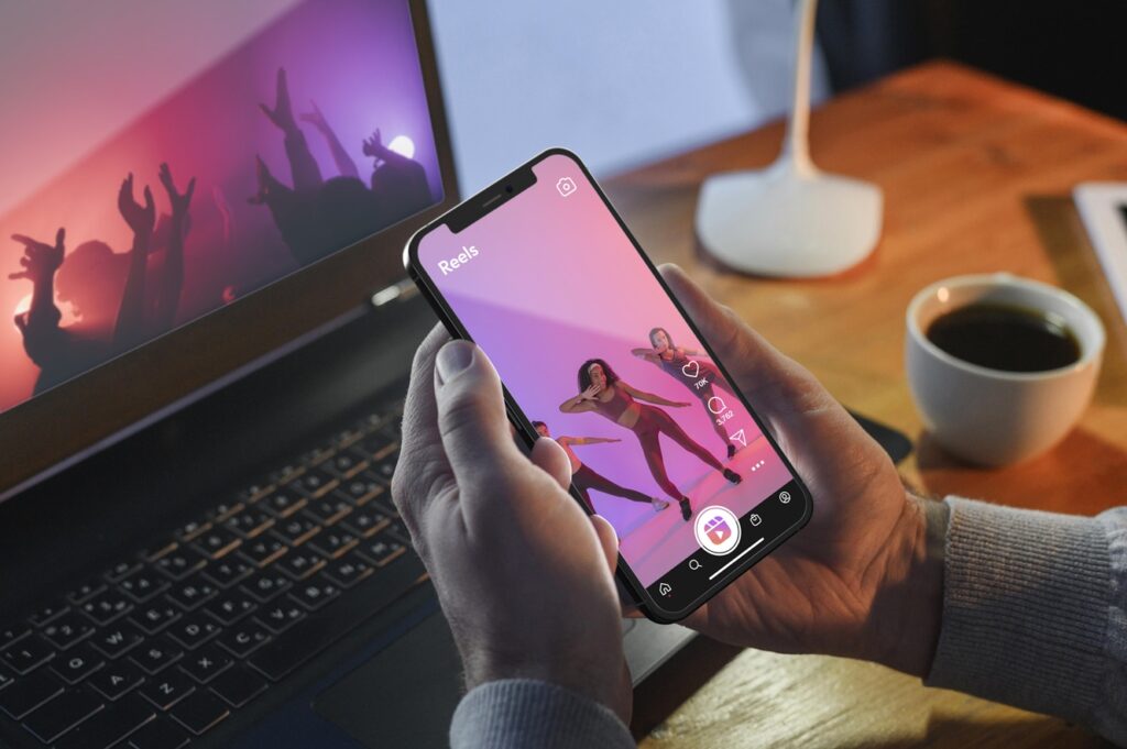 high angle hands holding smartphone