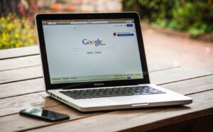 a laptop with the google search page